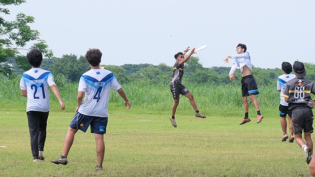 Play frisbee at the UP Diliman Academic Oval.