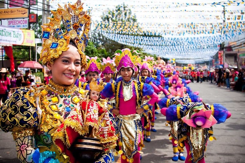 Participate in Filipino festivals
