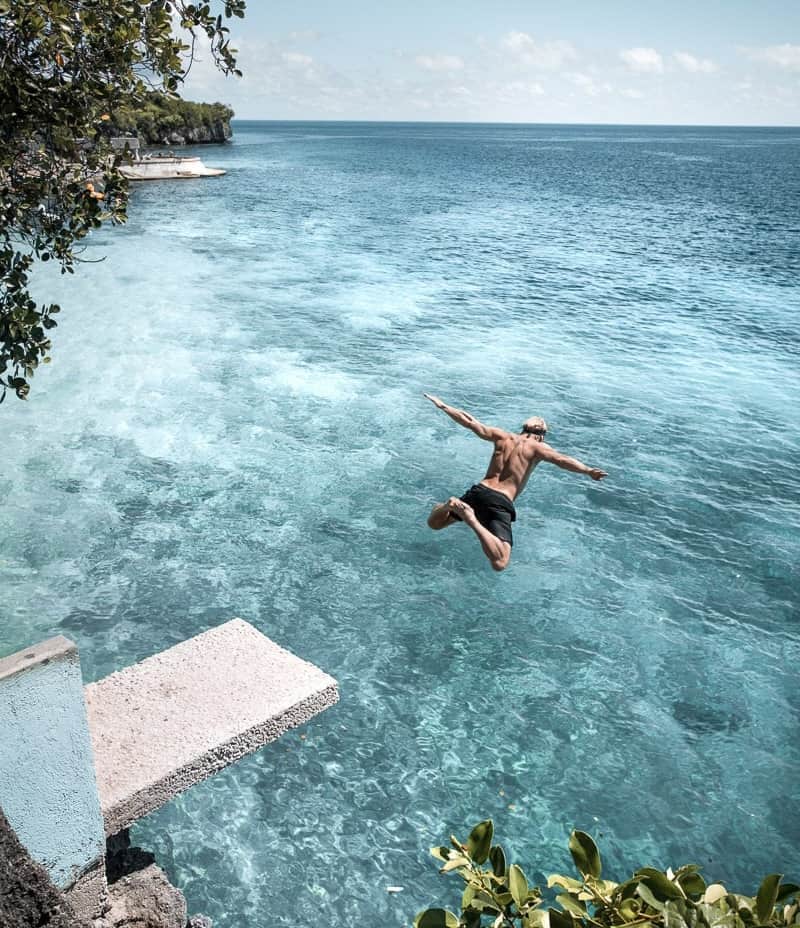 Take the plunge and go cliff jumping at Salagdoong Beach, Siquijor