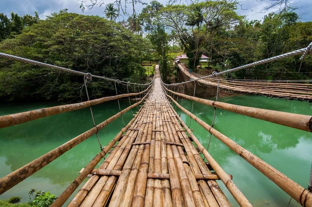 Walk across the Tigbao Hanging Bridge